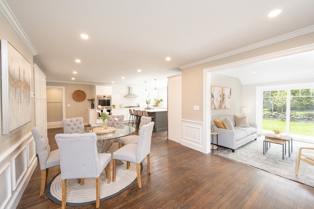 61 Sheffield Road Melrose, MA 02176 - Photo 9 of 21 a dining room with furniture and wooden floor