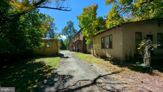 a view of a backyard of the house