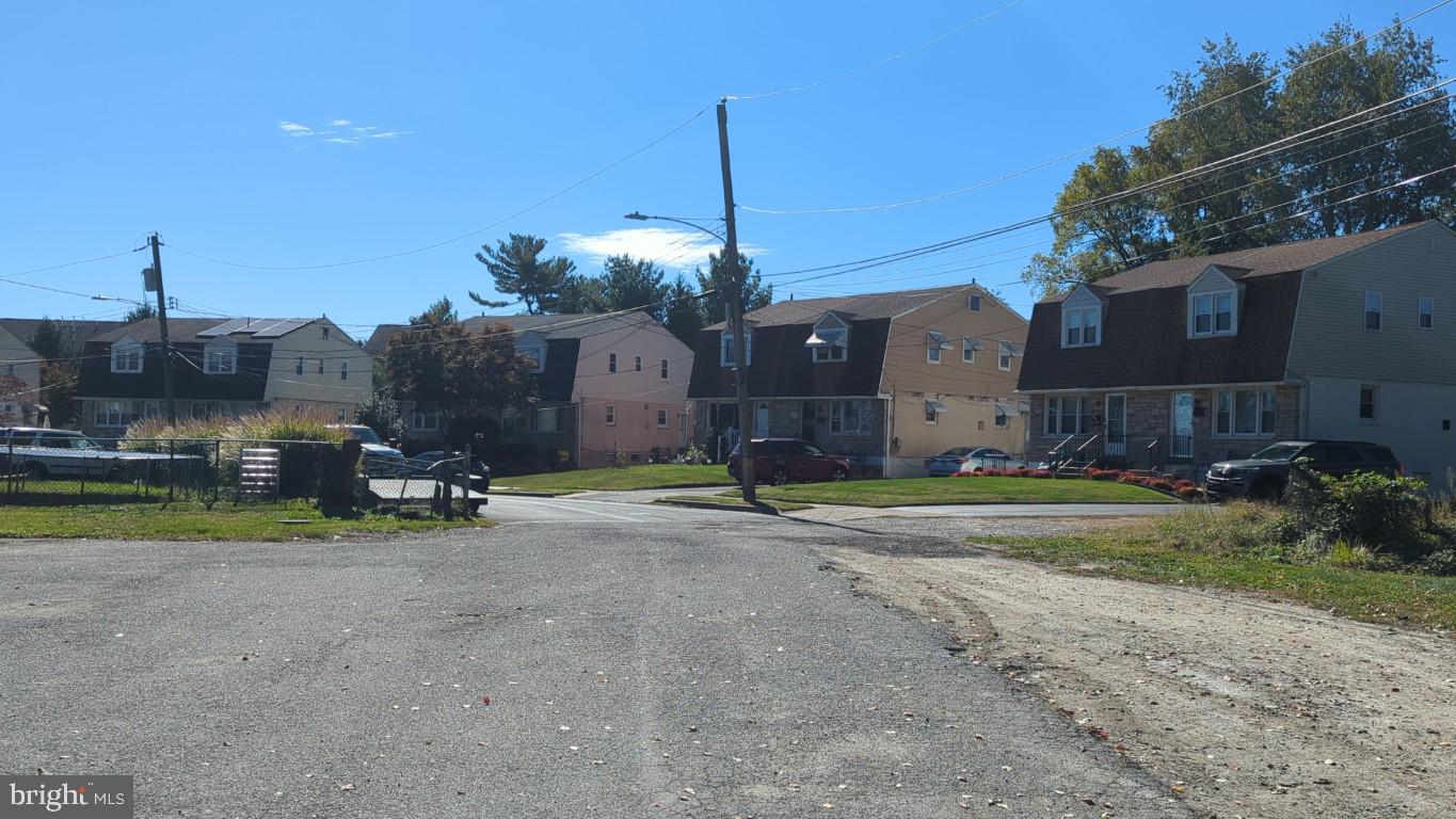 900 Main Street Brookhaven, PA 19015 - Photo 15 of 42 a front view of a house with a yard and garage