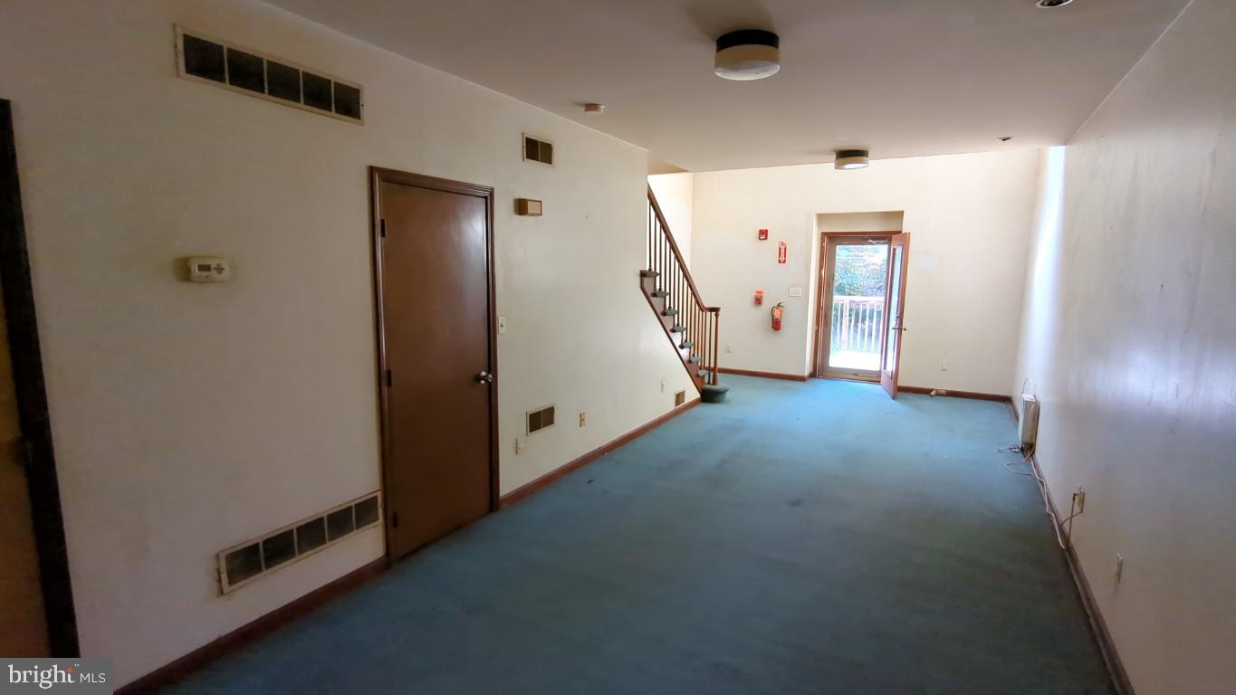 900 Main Street Brookhaven, PA 19015 - Photo 29 of 42 a view of a livingroom with stairs