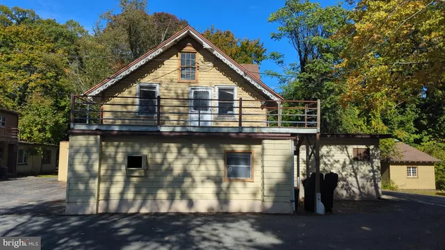 a front view of a house with a garage