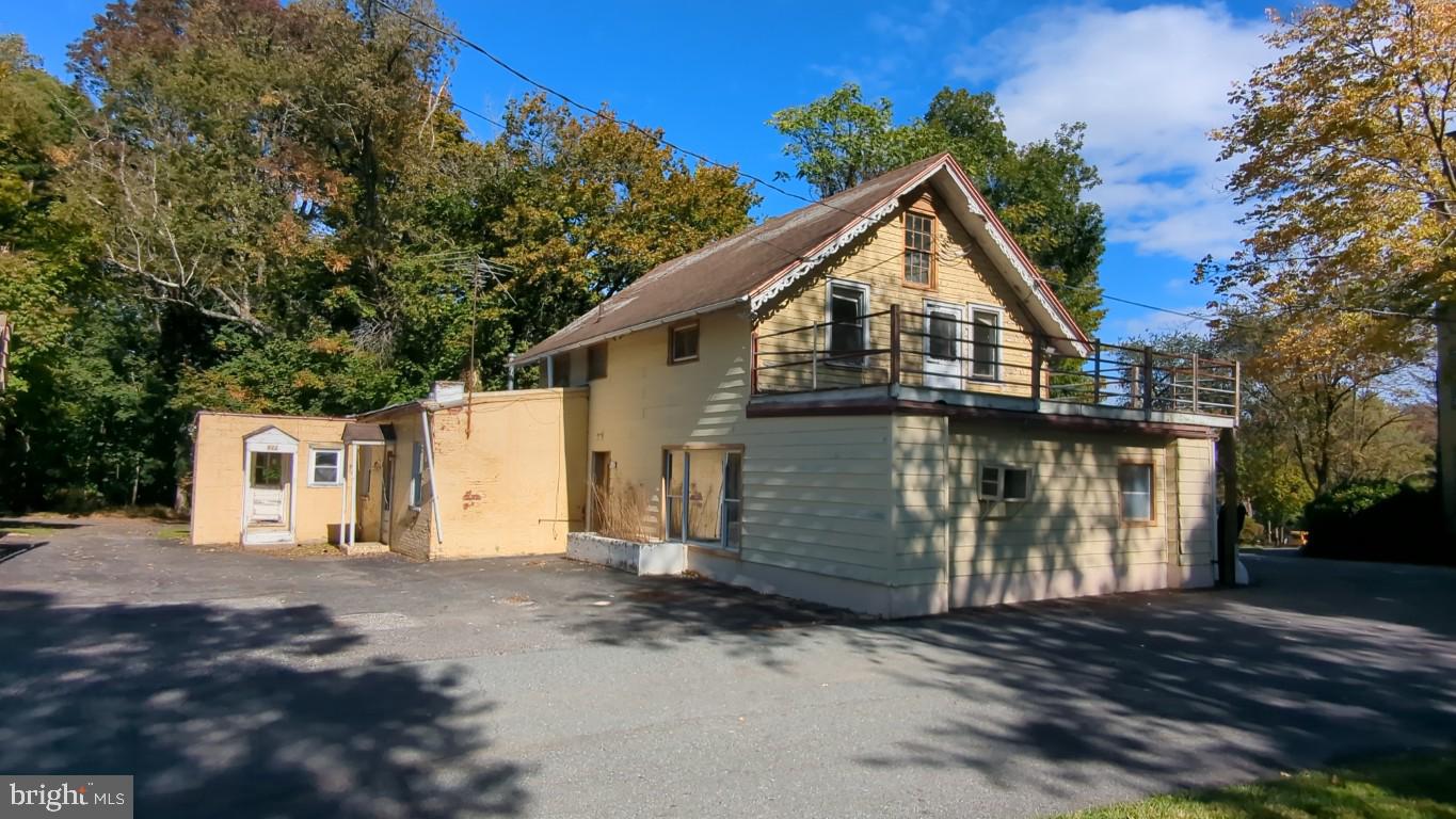 900 Main Street Brookhaven, PA 19015 - Photo 38 of 42 a front view of a house with a garage