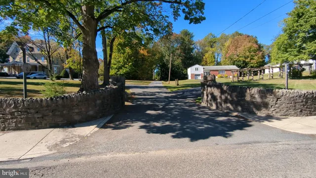 a view of a bench in a backyard