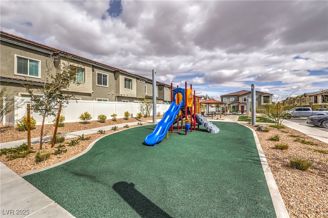 7232 North Decatur Boulevard, Unit 4 North Las Vegas, NV 89084 - Photo 33 of 36 Community jungle gym with fence
