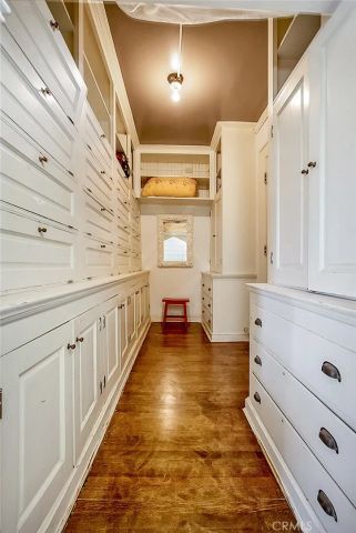 a view of a hallway with closet