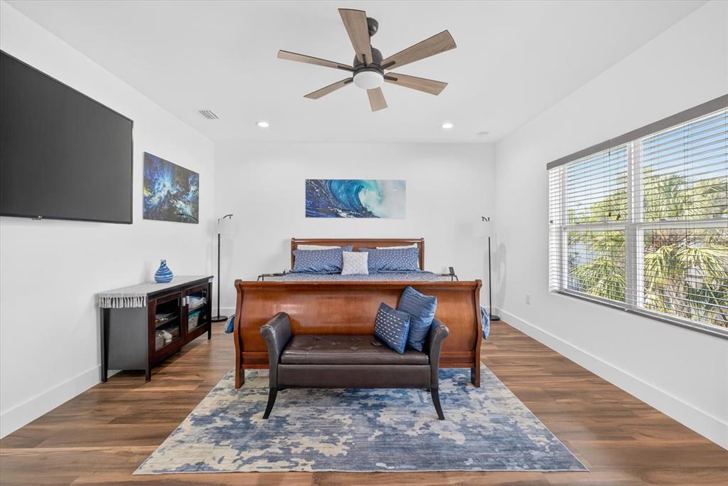 7301 South Elliott Street Tampa, FL 33616 - Photo 36 of 54 a bedroom with furniture and a rug