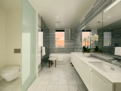 a spacious bathroom with a bathtub sink and toilet