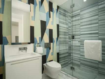 a bathroom with a toilet and a sink