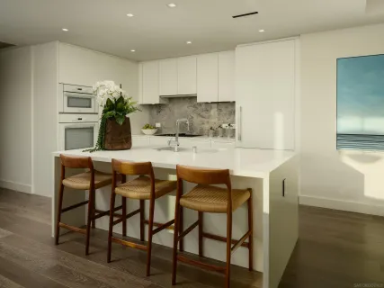 a kitchen with a table and chairs in it