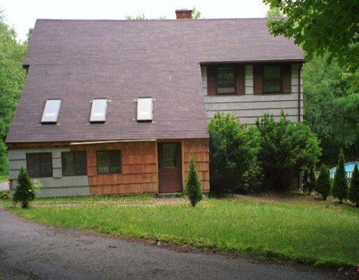 27 Ripton Road Shelton, CT 06484 - Photo 1 of 1 a front view of a house with a yard