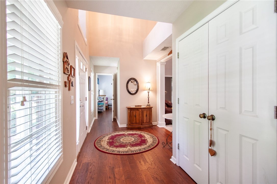 575 Deer Run Road Auburn, AL 36832 - Photo 7 of 42 You can admire the beautiful wood floors with this view of the entry hall and entry closet.