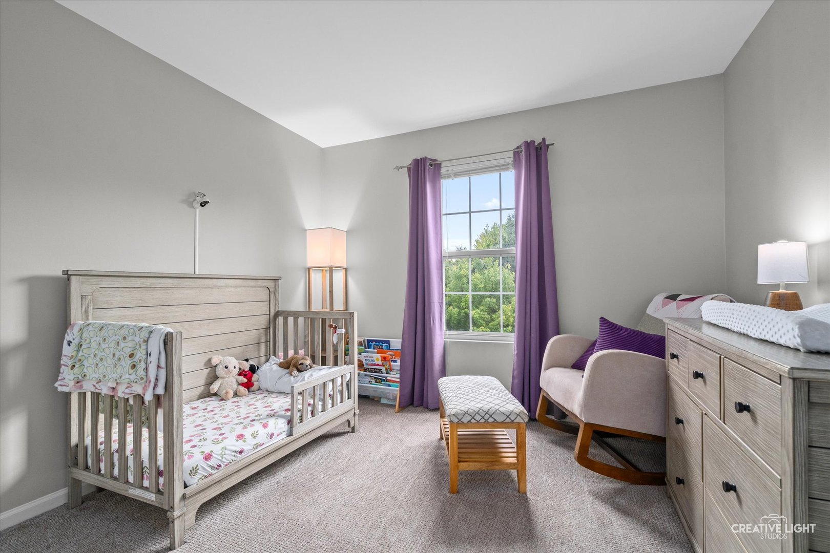 616 Springbrook Trail North Oswego, IL 60543 - Photo 14 of 18 a bedroom with a bed and a window