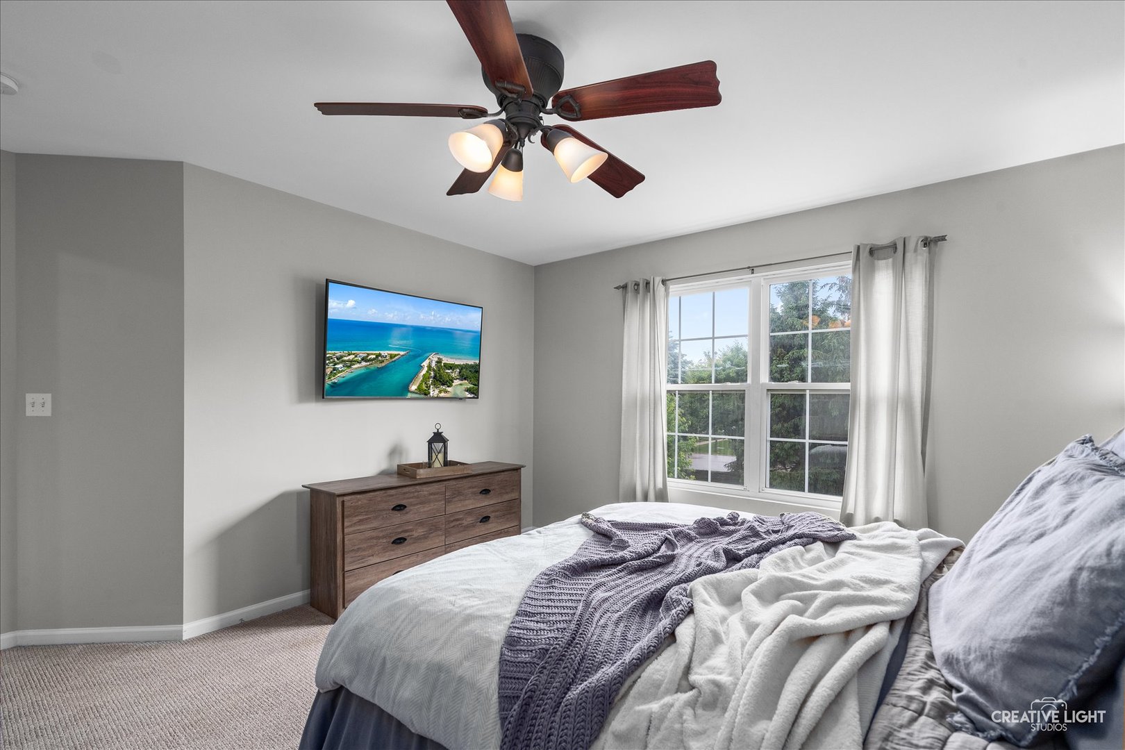616 Springbrook Trail North Oswego, IL 60543 - Photo 16 of 18 a bedroom with a bed and a window