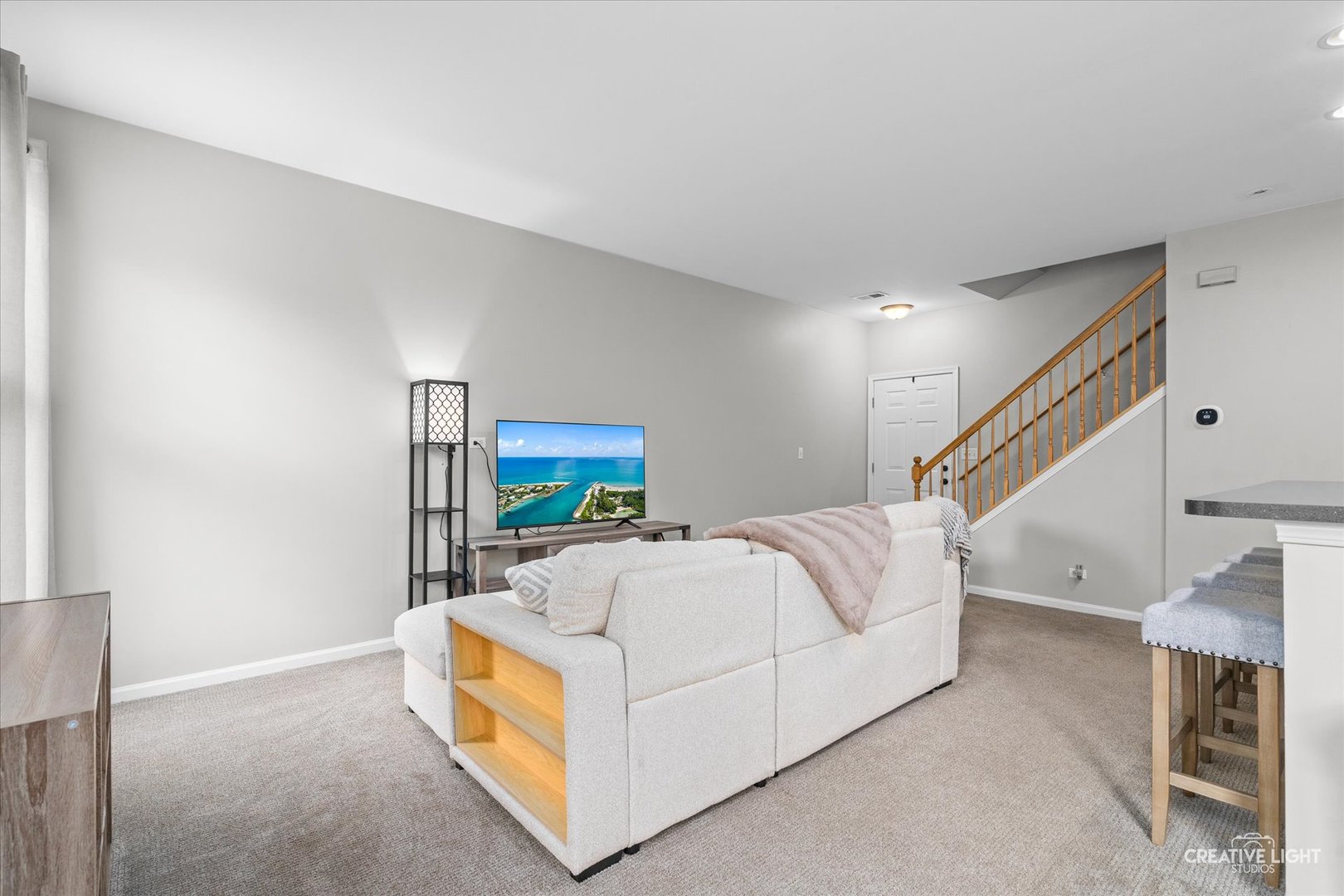 616 Springbrook Trail North Oswego, IL 60543 - Photo 7 of 18 a bed room with a bed and a couch