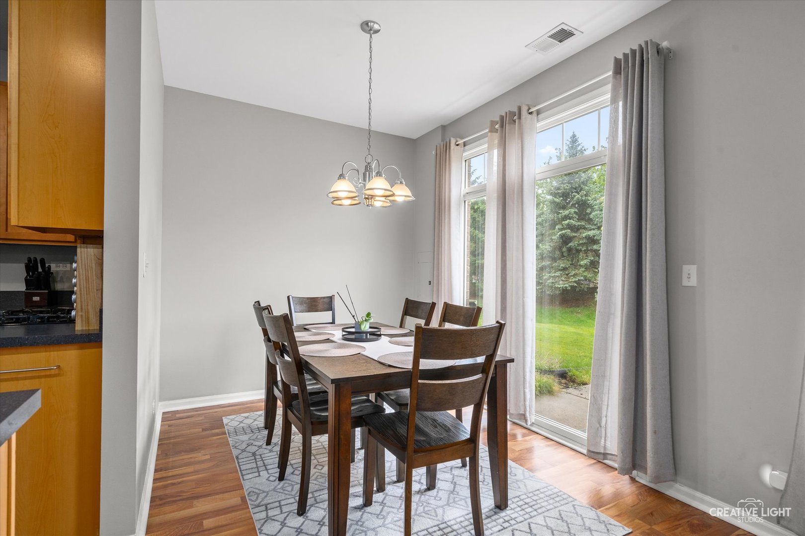 616 Springbrook Trail North Oswego, IL 60543 - Photo 9 of 18 a view of a dining room with furniture window and outside view