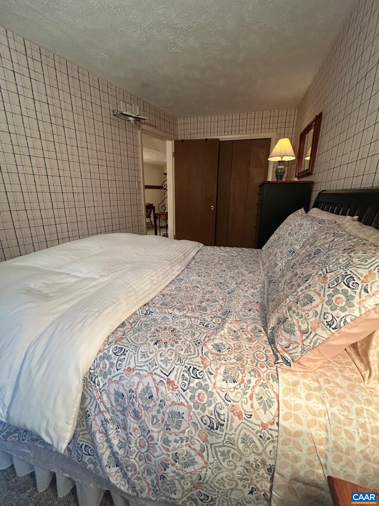240 Timbers Roseland, VA 22967 - Photo 16 of 22 a bedroom with a bed and a closet