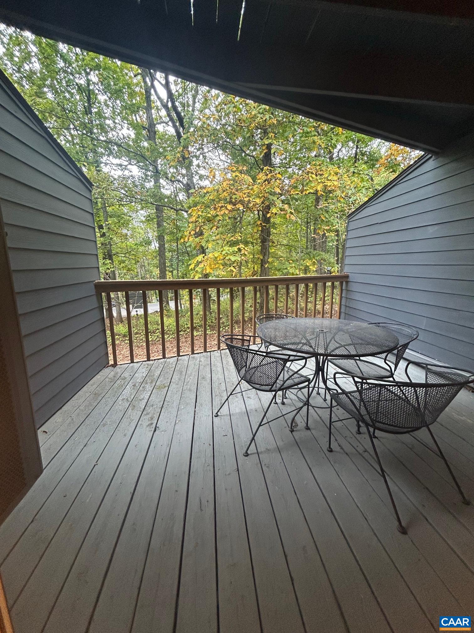 240 Timbers Roseland, VA 22967 - Photo 18 of 22 a view of balcony with chairs and wooden floor