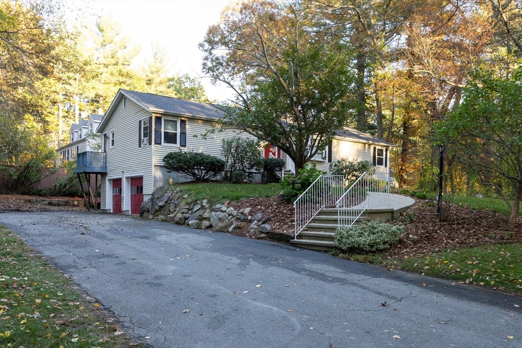 11 Edgeworth Street Billerica, MA 01821 - Photo 1 of 40 a front view of a house with a yard