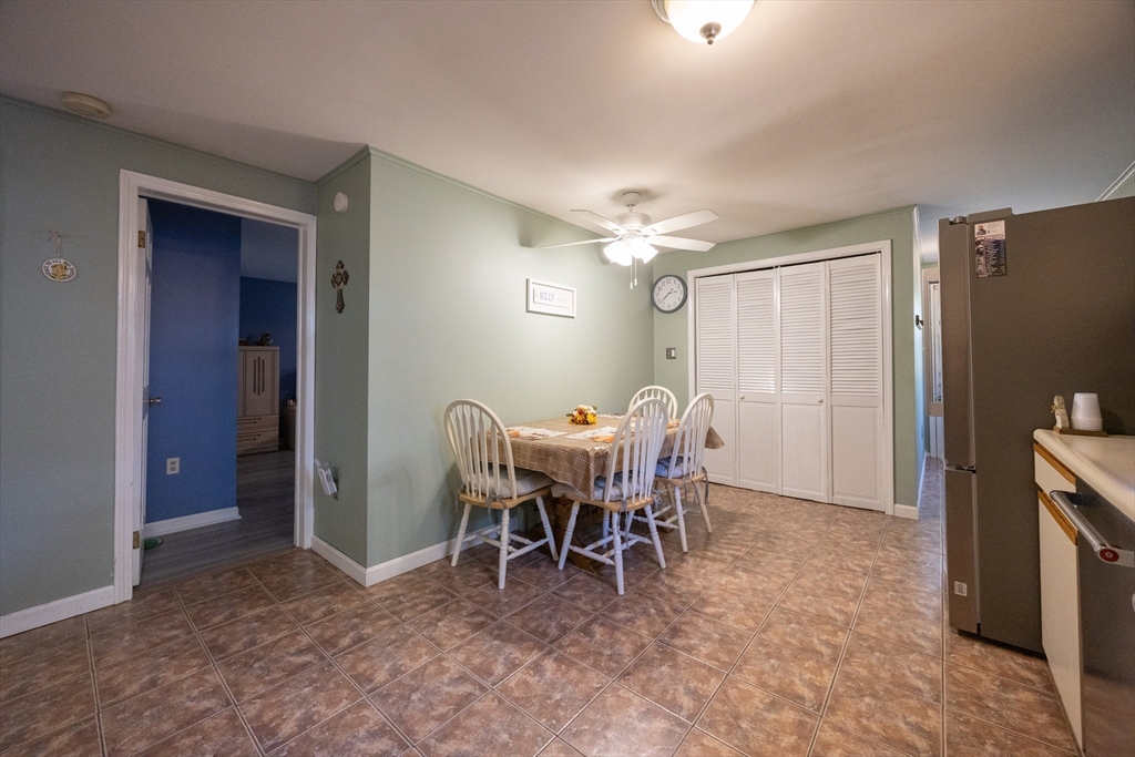 11 Edgeworth Street Billerica, MA 01821 - Photo 15 of 40 a dining room with furniture and chandelier