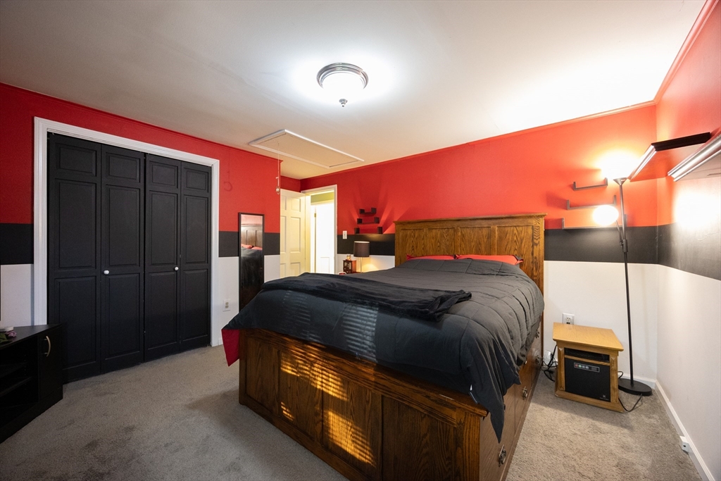 11 Edgeworth Street Billerica, MA 01821 - Photo 18 of 40 a bedroom with a bed and a closet