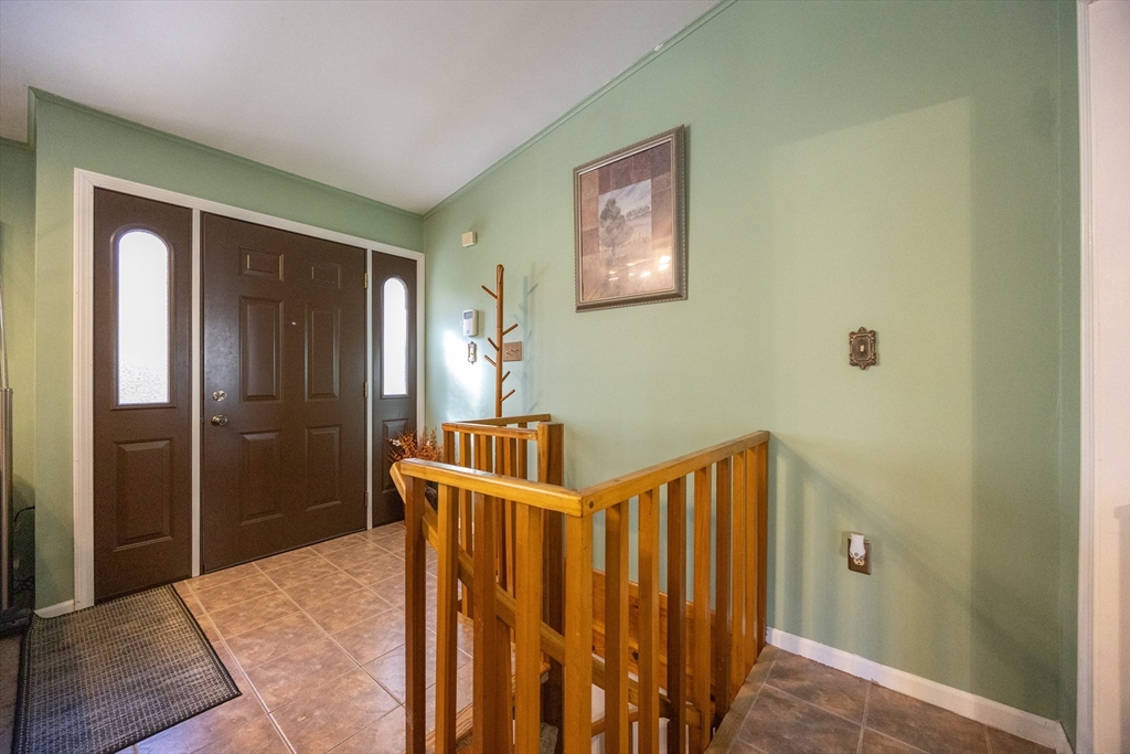 11 Edgeworth Street Billerica, MA 01821 - Photo 22 of 40 a view of hallway with a mirror
