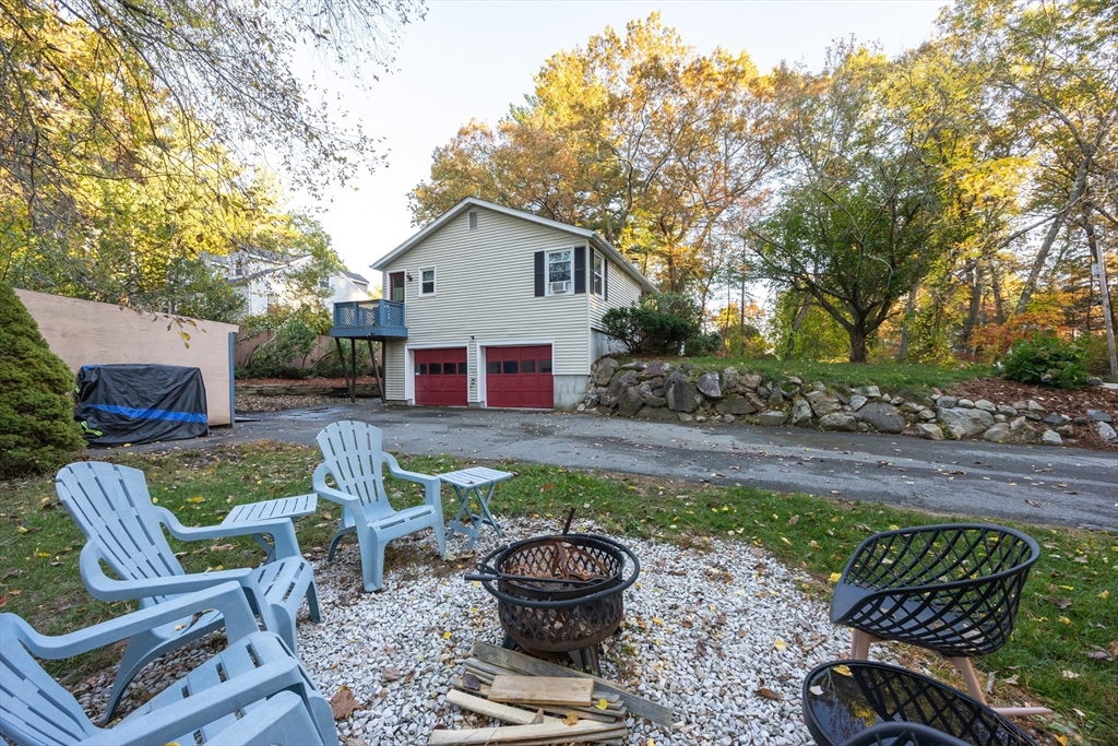 11 Edgeworth Street Billerica, MA 01821 - Photo 36 of 40 a view of a backyard with sitting area