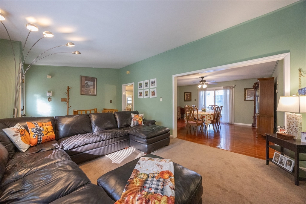 11 Edgeworth Street Billerica, MA 01821 - Photo 10 of 40 a living room with furniture and a couch
