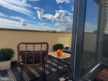 a picture of a bench in a white building