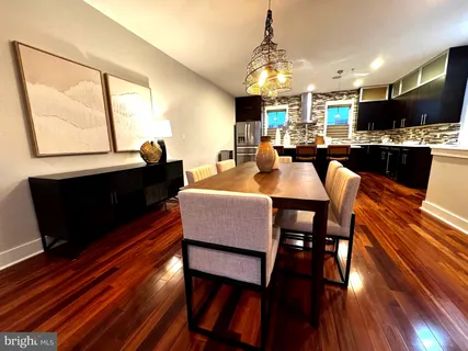 a bathroom with a tub and sink