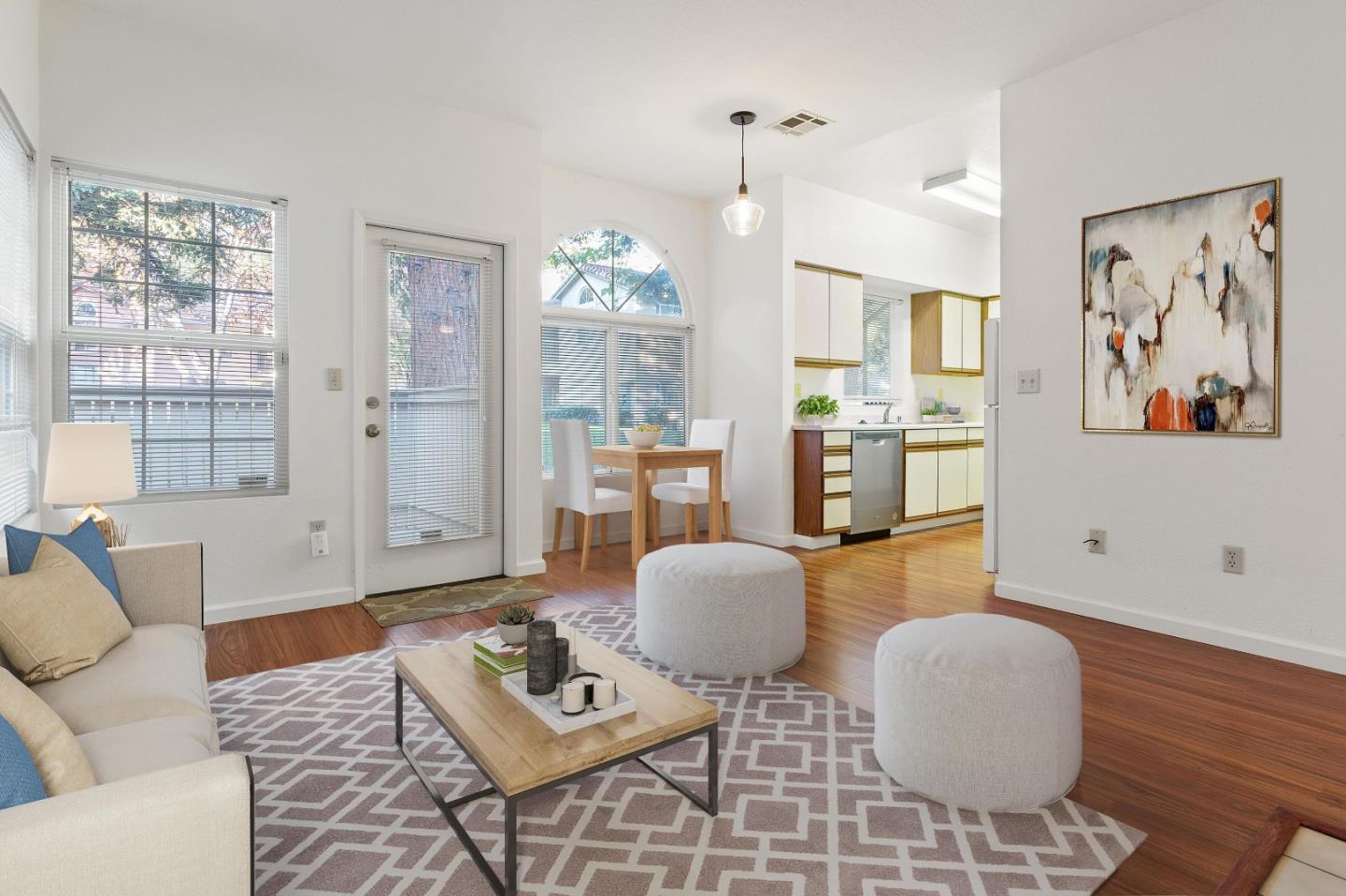 1403 Forest Run Hercules, CA 94547 - Photo 1 of 26 a living room with furniture and wooden floor