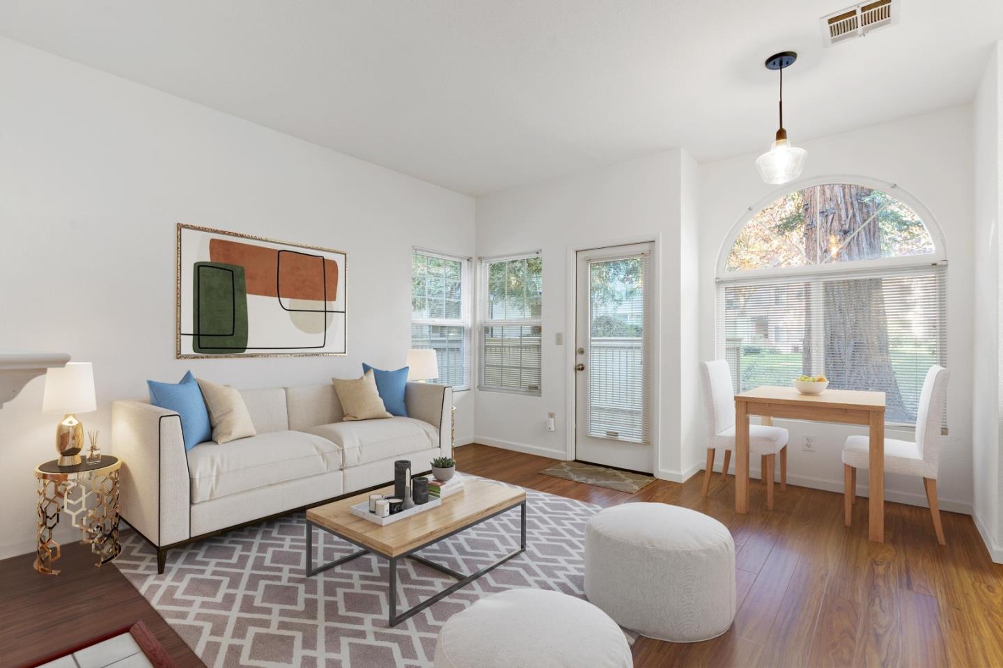 1403 Forest Run Hercules, CA 94547 - Photo 3 of 26 a living room with furniture a dining table and a large window