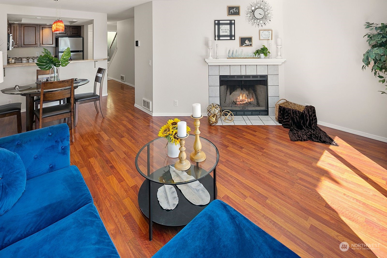8512 242nd Street Southwest, Unit 4 Edmonds, WA 98026 - Photo 11 of 24 a living room with furniture and a fireplace