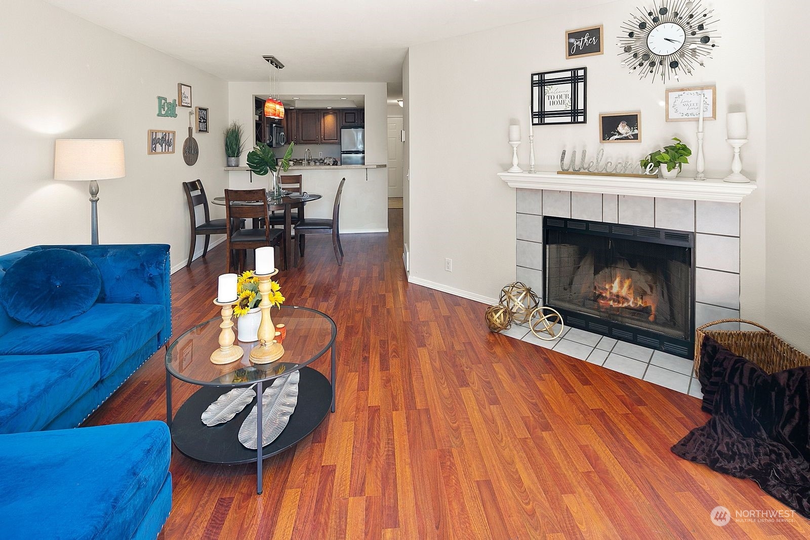 8512 242nd Street Southwest, Unit 4 Edmonds, WA 98026 - Photo 12 of 24 a living room with furniture and a fireplace