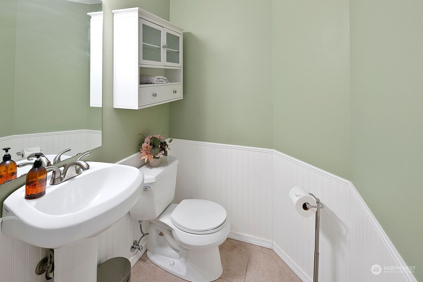 8512 242nd Street Southwest, Unit 4 Edmonds, WA 98026 - Photo 14 of 24 a bathroom with a sink a toilet and mirror