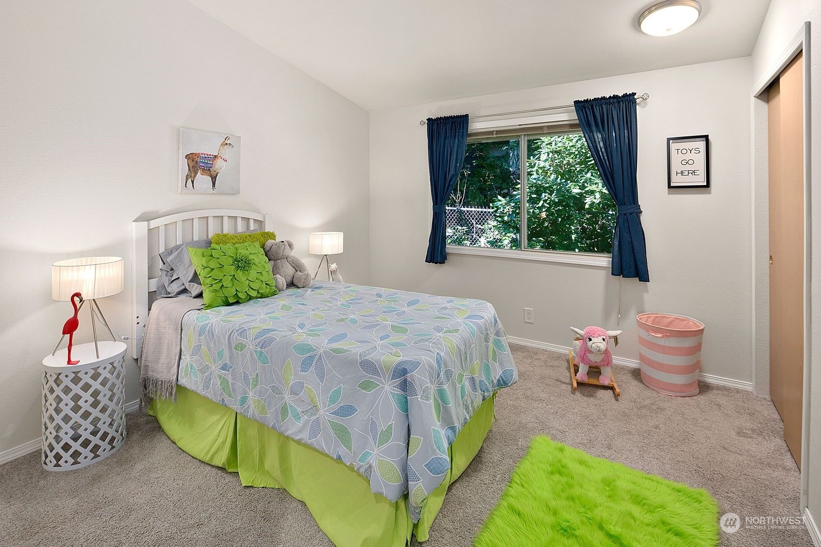 8512 242nd Street Southwest, Unit 4 Edmonds, WA 98026 - Photo 17 of 24 a bedroom with a bed and a window