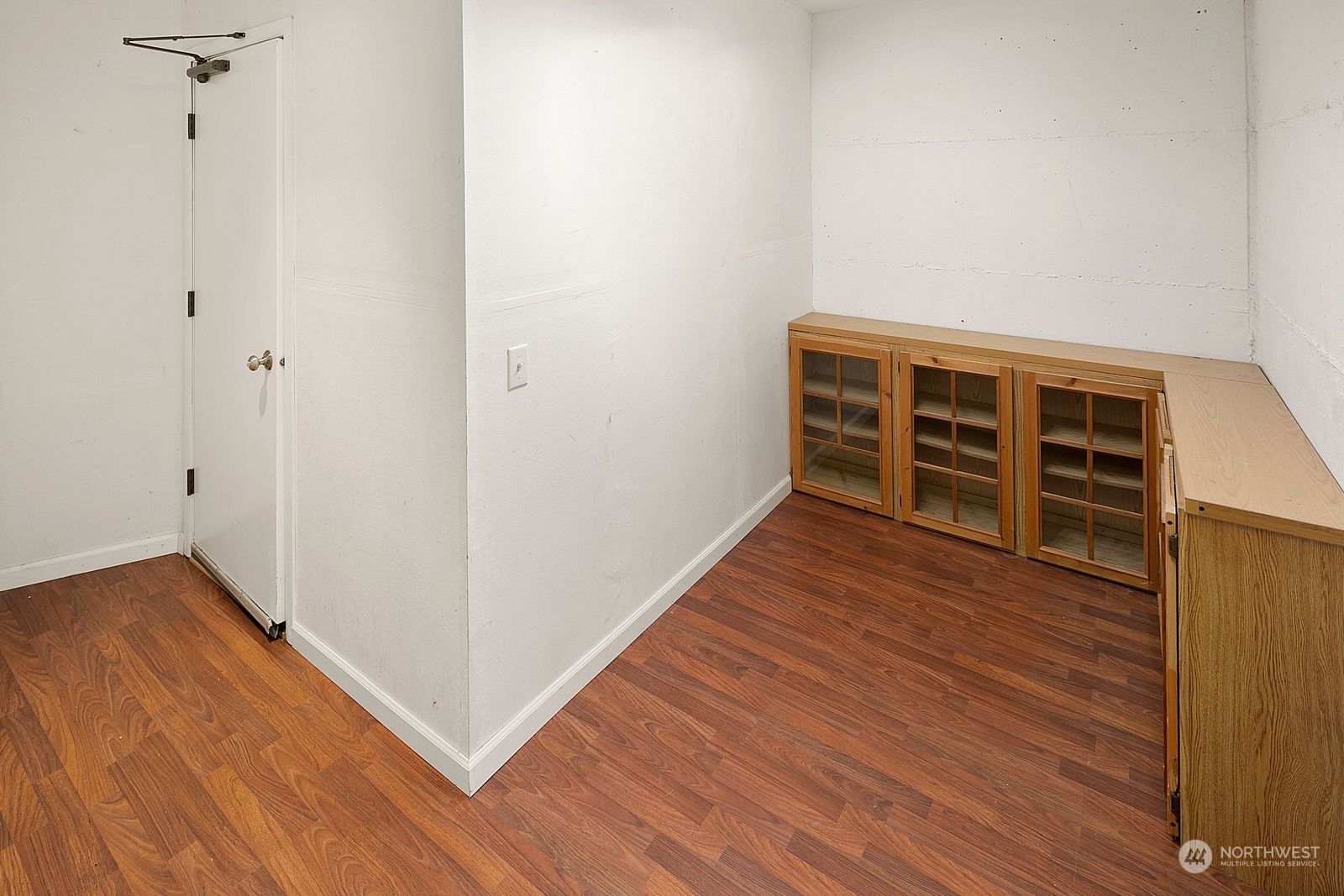 8512 242nd Street Southwest, Unit 4 Edmonds, WA 98026 - Photo 20 of 24 a view of a room with wooden floor