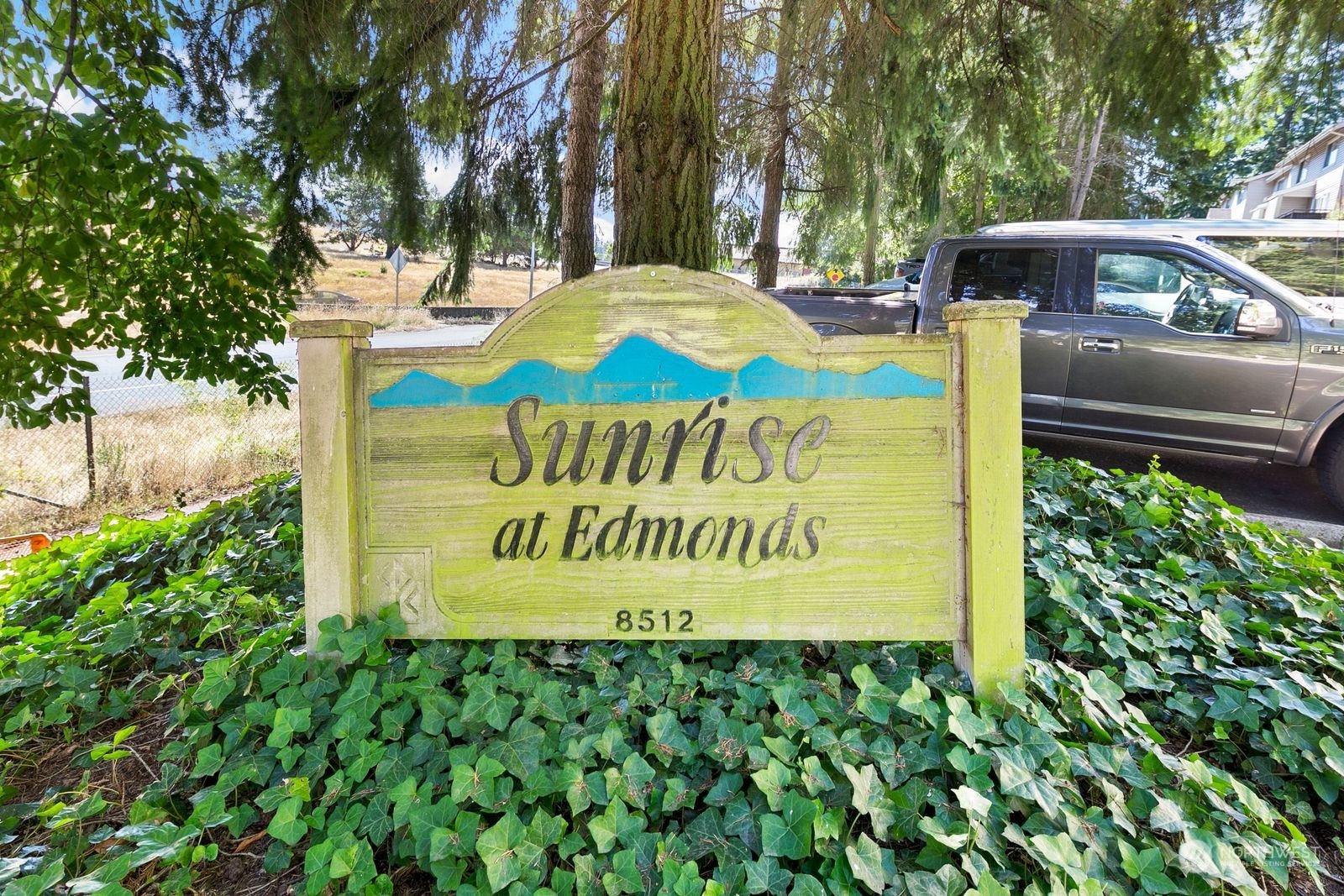 8512 242nd Street Southwest, Unit 4 Edmonds, WA 98026 - Photo 24 of 24 a sign on the side of the road