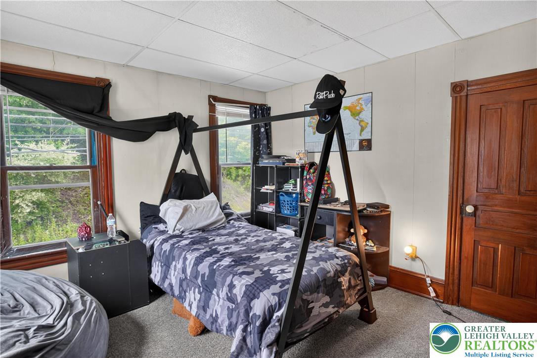 357 Main Road Lehighton, PA 18235 - Photo 25 of 38 a bed sitting in a bedroom next to a window