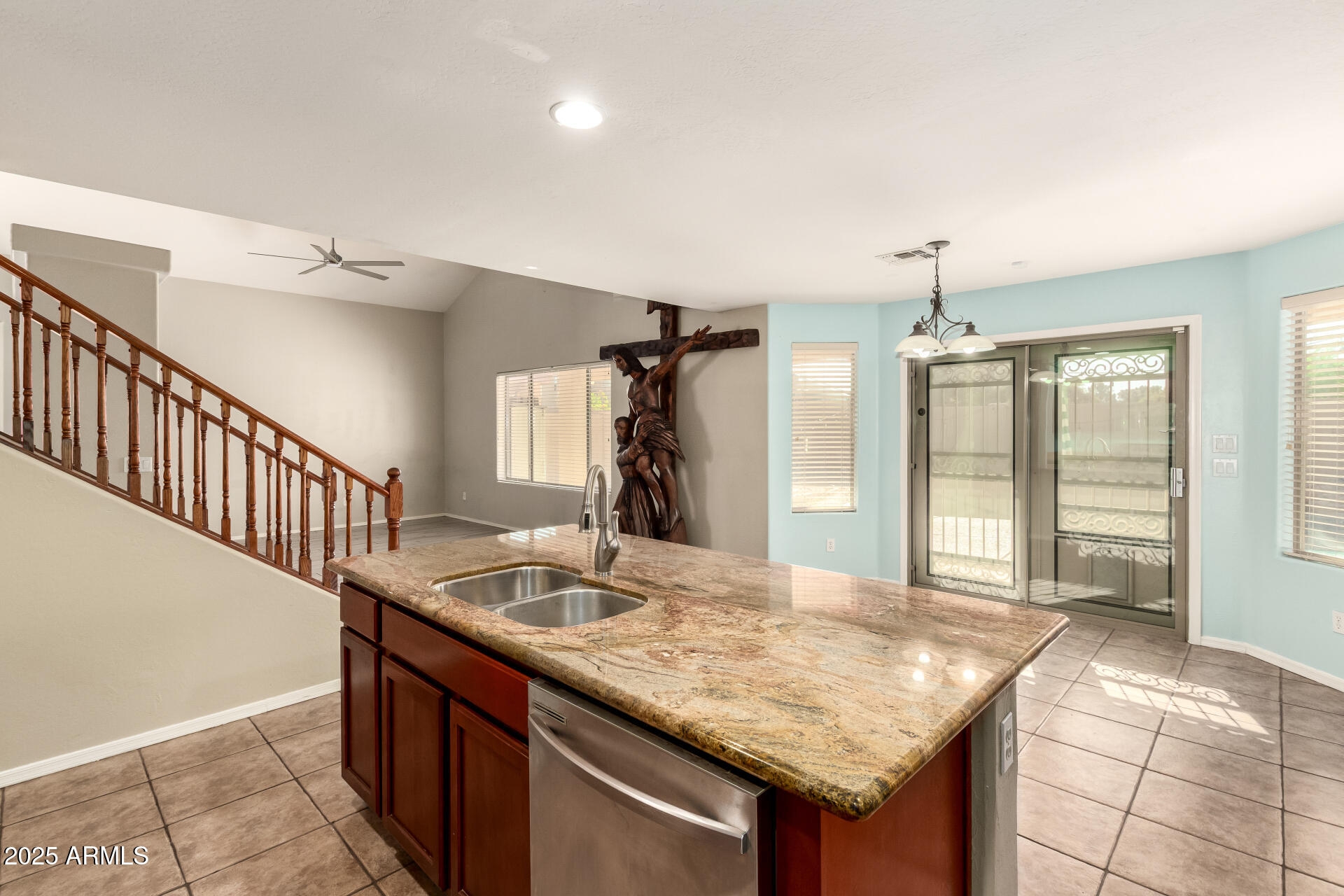 4403 West Maldonado Road Laveen, AZ 85339 - Photo 15 of 37 a bathroom with a granite countertop sink and a mirror