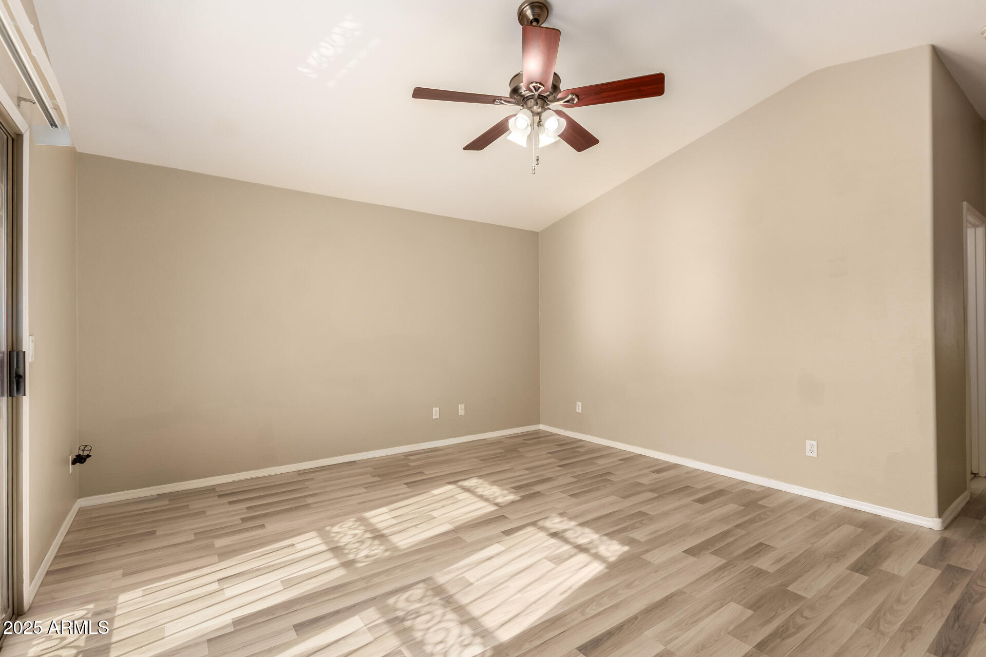 4403 West Maldonado Road Laveen, AZ 85339 - Photo 22 of 37 a view of a room with a ceiling fan