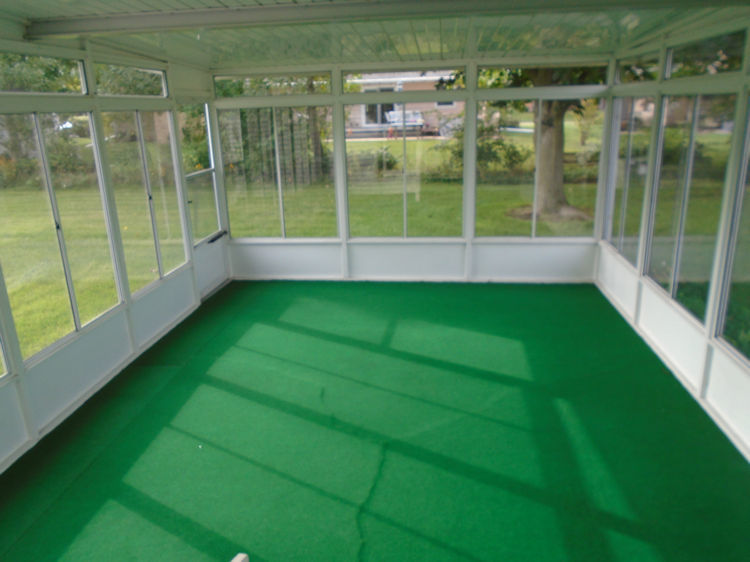 202 Linder Lane Rochelle, IL 61068 - Photo 16 of 17 a view of a glass door with a yard