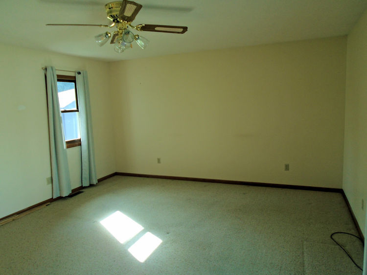 202 Linder Lane Rochelle, IL 61068 - Photo 7 of 17 an empty room with a window