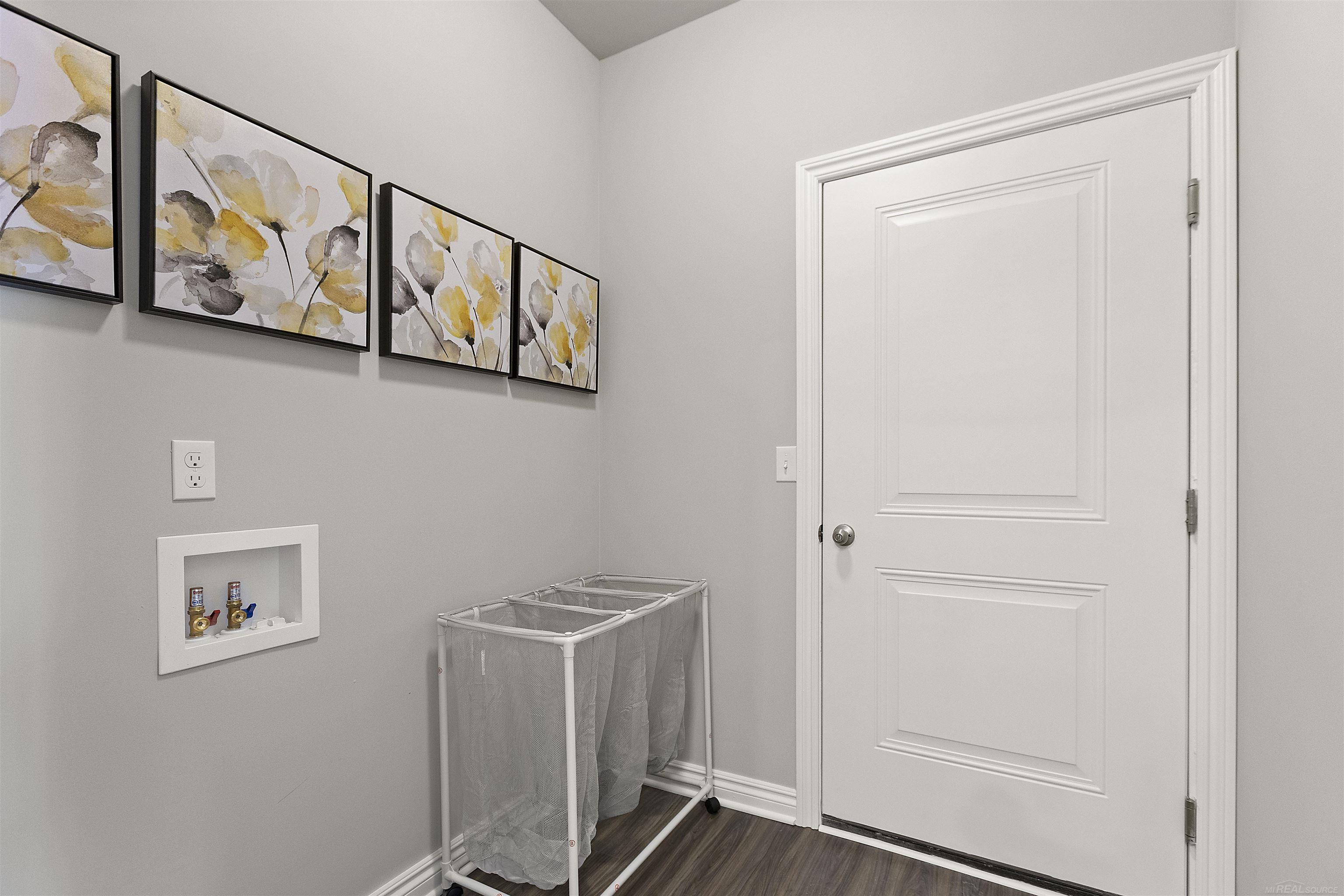 9932 Crossview Trail Howell, MI 48855 - Photo 20 of 25 Laundry Room