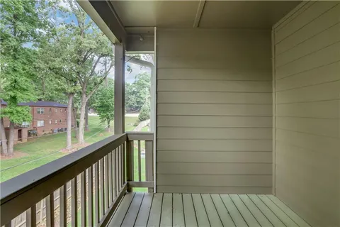 a view of a wooden fence