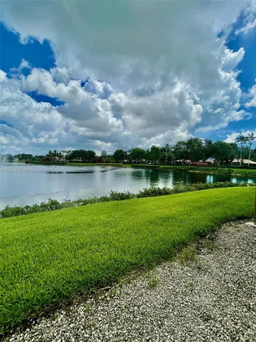 a view of a lake with a city