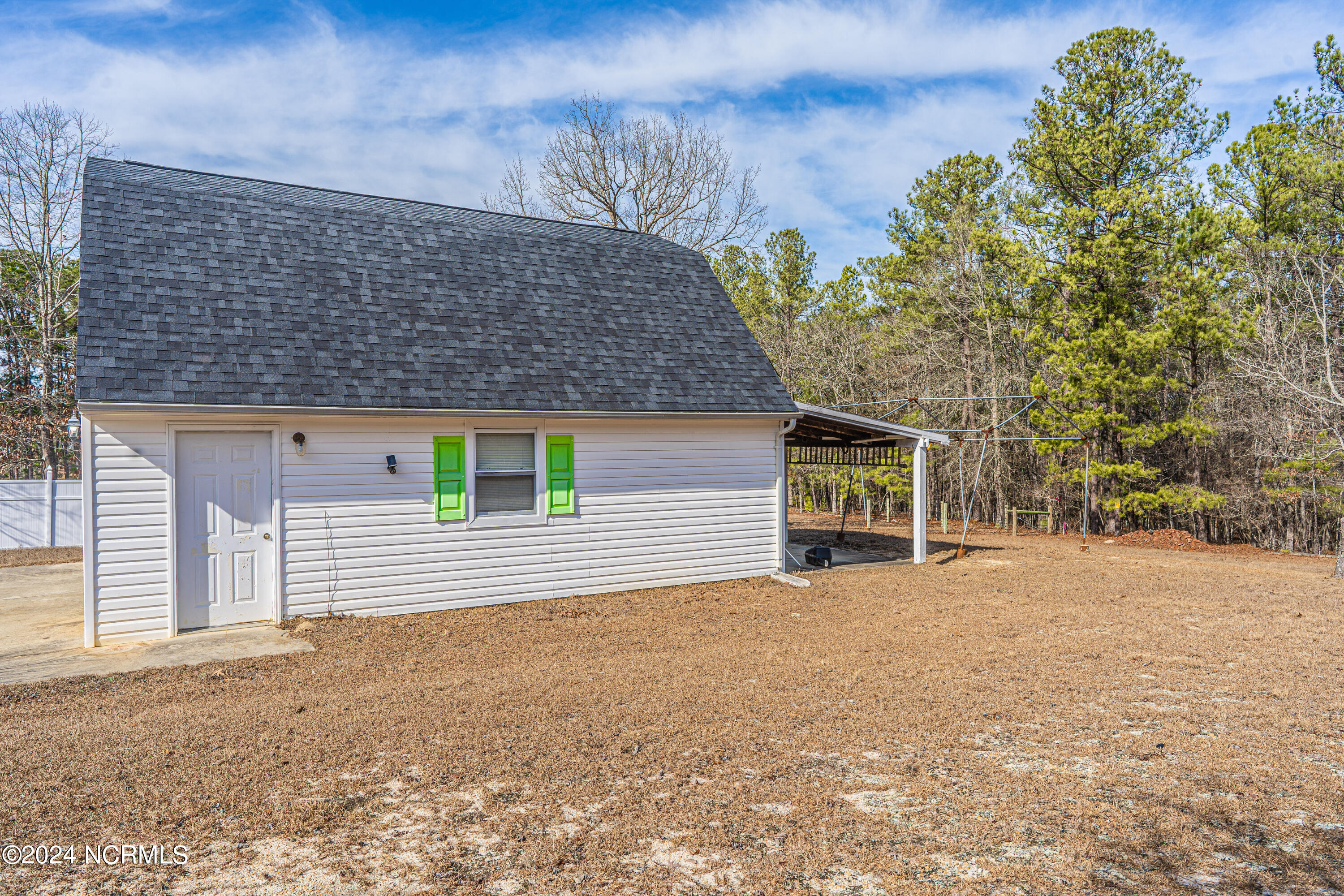 412 Pinecrest Court Road Aberdeen, NC 28315 - Photo 13 of 64 28' x 24' Detached Garage with lean-to storage