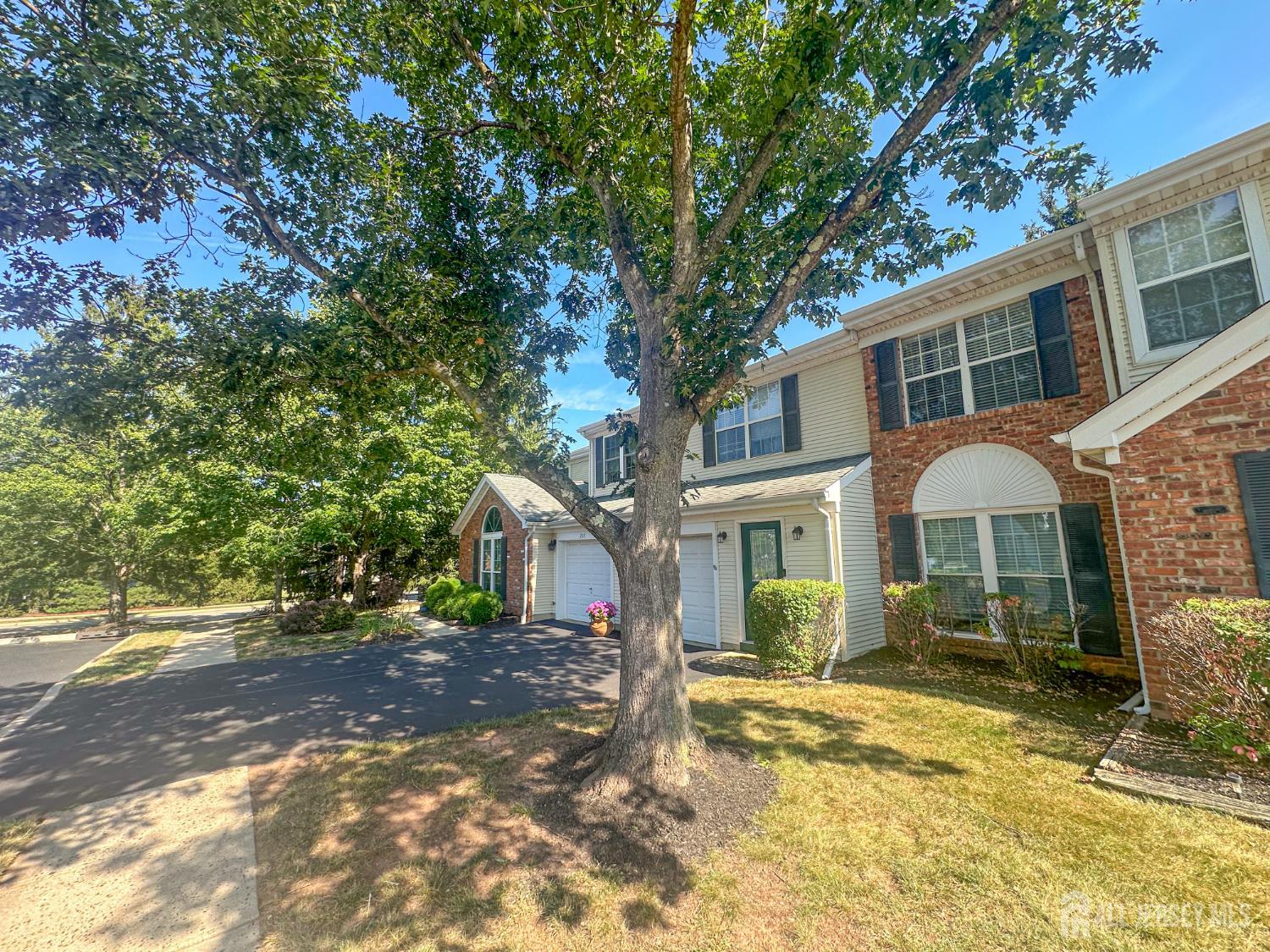 266 Dochery Place Somerset, NJ 08873 - Photo 11 of 20 a view of a yard in front of a house