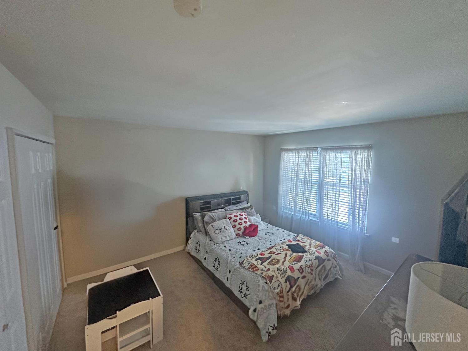 266 Dochery Place Somerset, NJ 08873 - Photo 16 of 20 a bedroom with a bed and a window