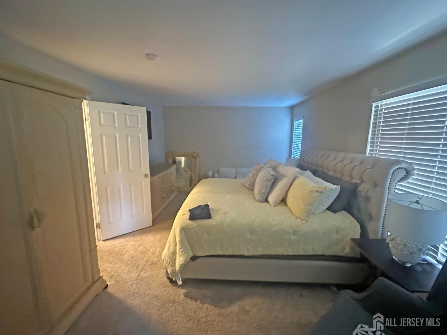 266 Dochery Place Somerset, NJ 08873 - Photo 10 of 20 a bedroom with a bed and chair