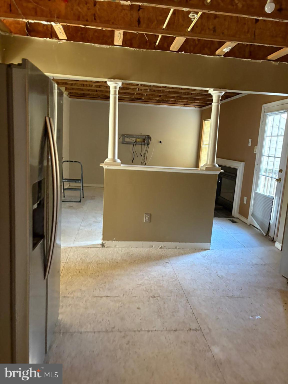 9310 Biemans Terrace Bowie, MD 20721 - Photo 12 of 40 a view of water heater room with wooden floor